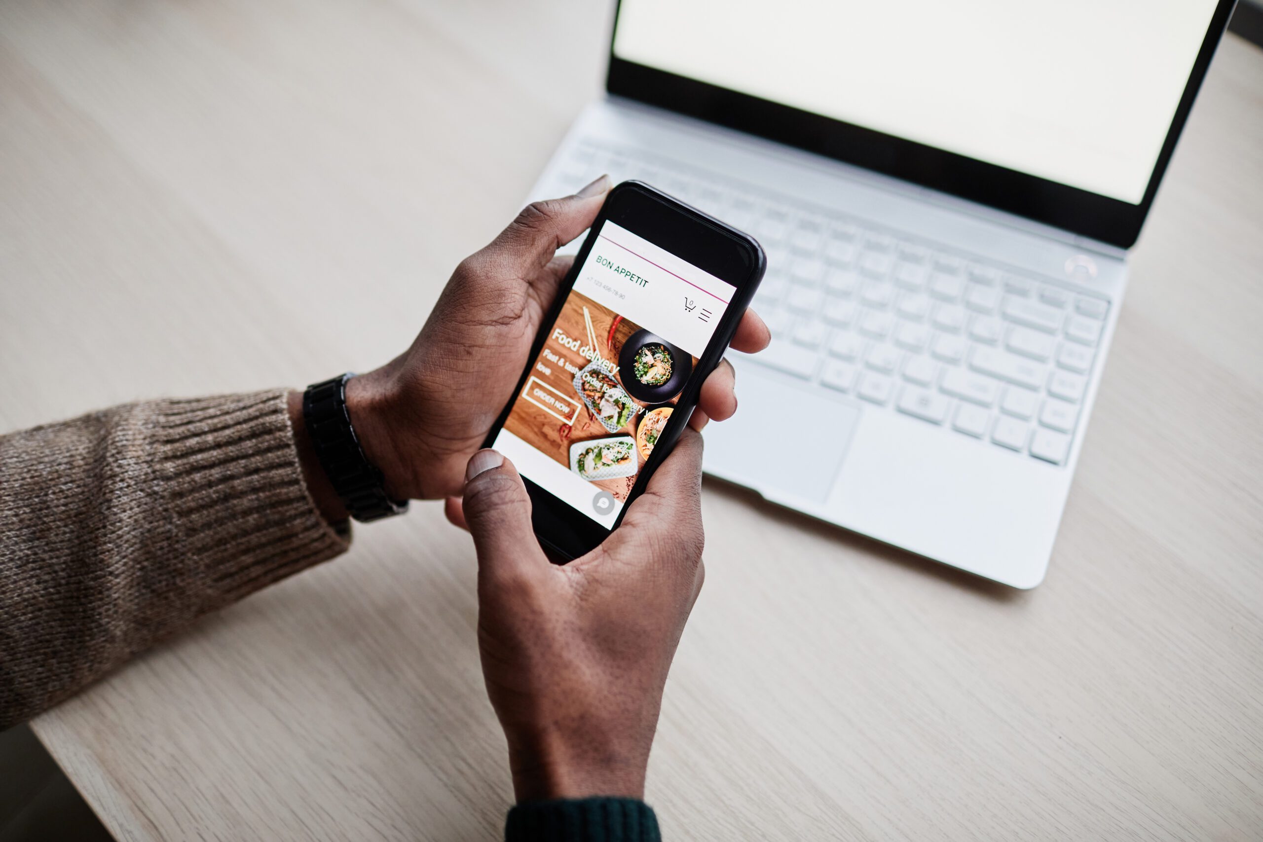 Eko Square | Person Using Food Delibery App - Eko Square - Web Developer Columbus Ohio